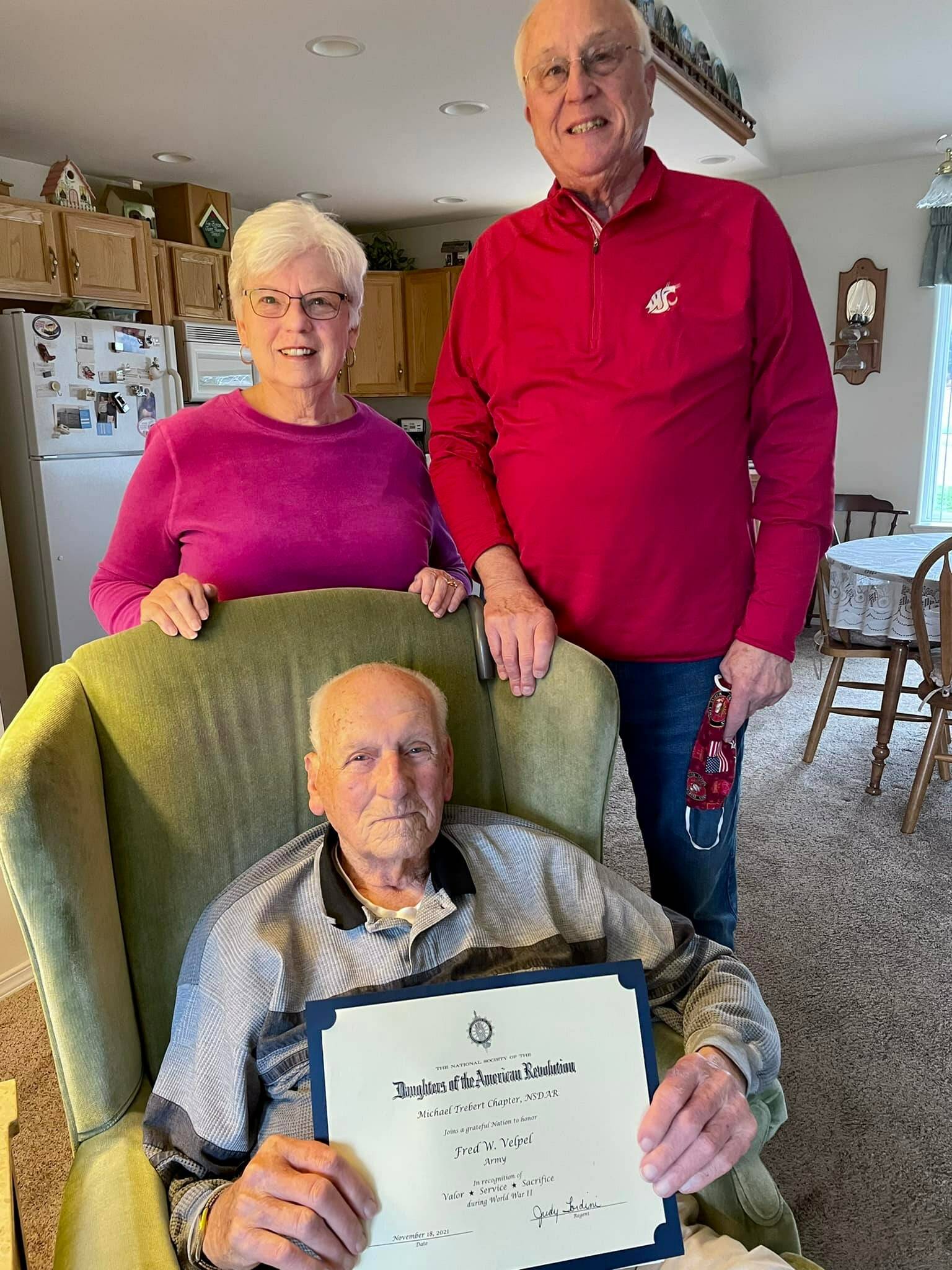 Fred Velpel, a World War II veteran (U.S. Army), receives a commemorative National Society of the Daughters of the American Revolution “thank you for your service” certificate. Submitted photo