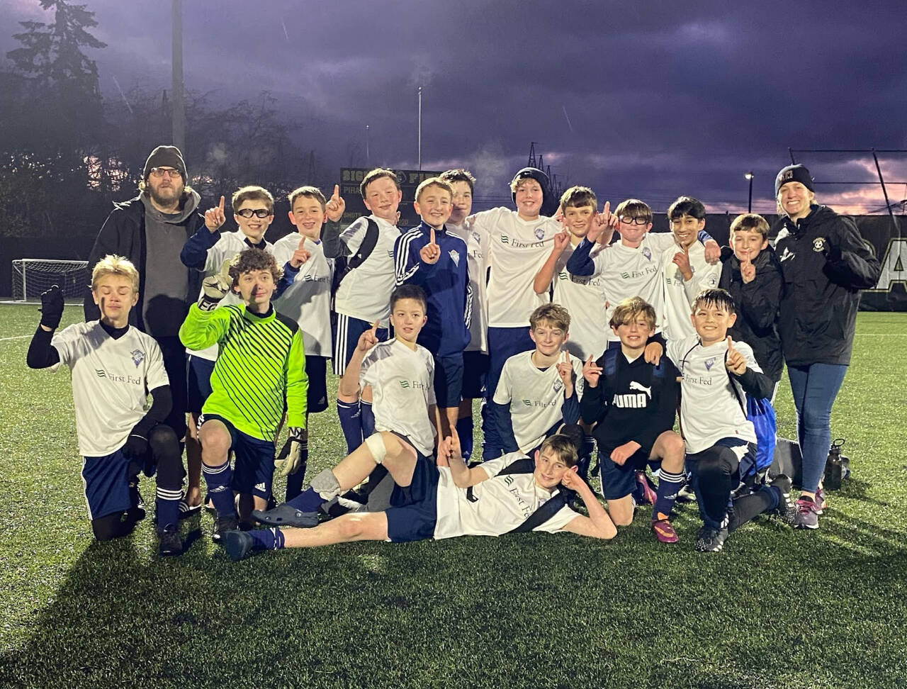 The Storm King U13 Thunder won its North Puget Soccer League division with an 11-1-0 record. From left, back row, are head coach Jared King, Harper Willis, Max Sturdevant, Riley Brown, Ben Bower, Jake Loushin, Taihvan Lyle, Ashton Gedelman, Cooper Twedt, Gagan Seera, Chase Gardner and assistant coach Amanda Anderson. From left, front row, are Zeke Banks, Eden Peterson, Kanyon Anderson, Trevor Goff, Kannon King and Favian Caiola. Lying on the grass is Abe Brenkman. Photo courtesy of Amanda Anderson