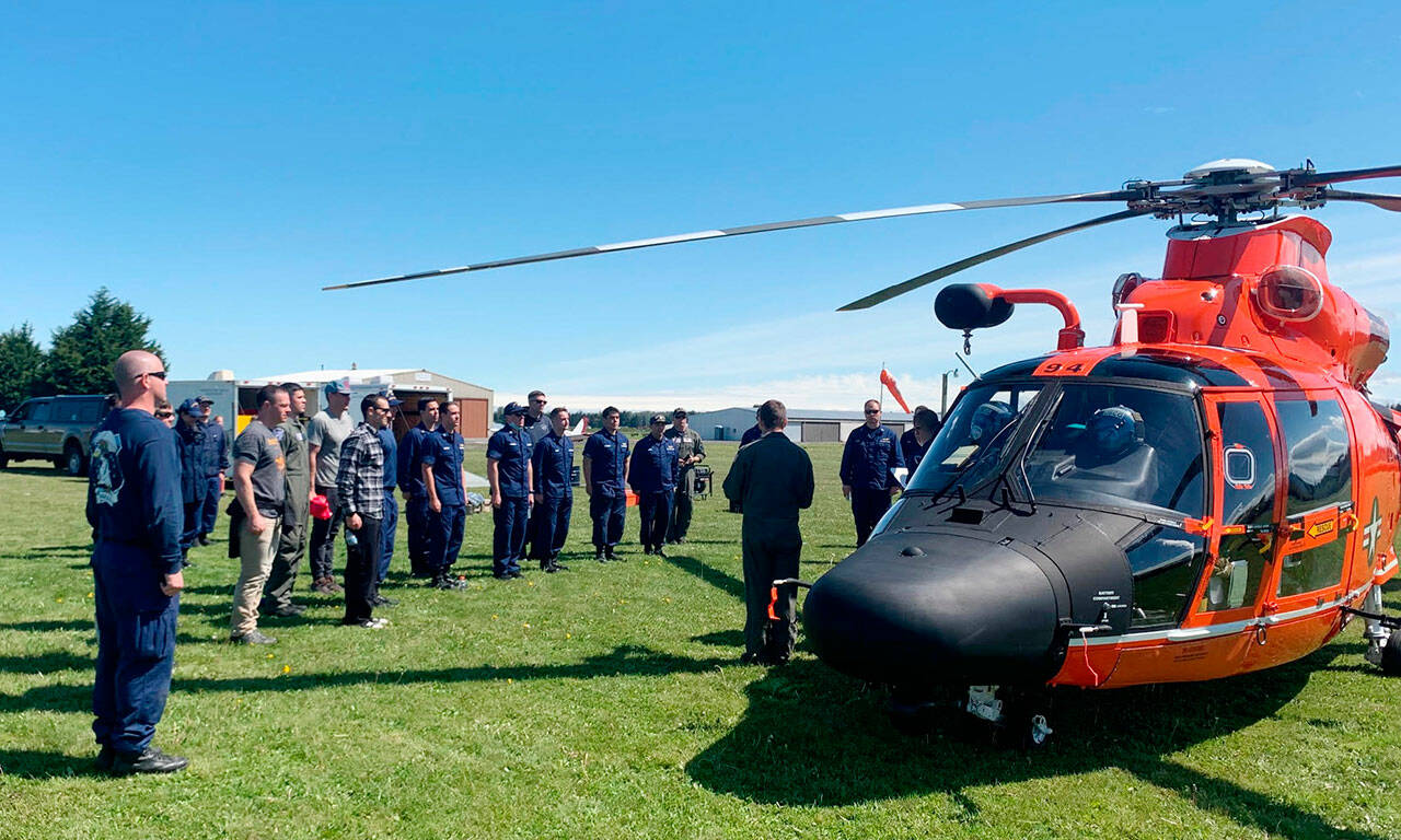 Members of U.S. Coast Guard, Clallam County Fire District 3, Port Angeles Police Department and Washington State Patrol participate in a training session at Sequim Valley Airport in April 2021. Photo courtesy of Andy Sallee/Sequim Valley Airport