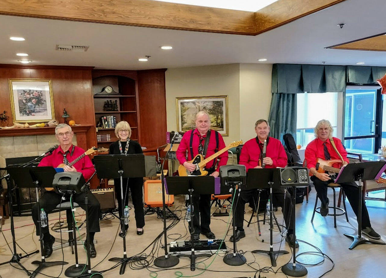 Buttercup Lane — which includes, from left, members Mike and Diane Johnson, Rodger Bigelow, Dave Keyte and Joe D’entrone — play at Olympic Theatre Arts Center on Jan. 67, part of the First Friday Art Walk Sequim for January. Submitted photo