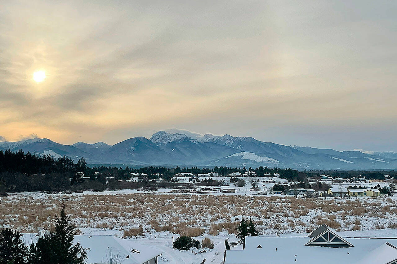 Snow from just before New Year’s Eve blankets the area stretching from Hogback Road to the Olympic Mountains. Sequim Gazette photo by Matthew Nash