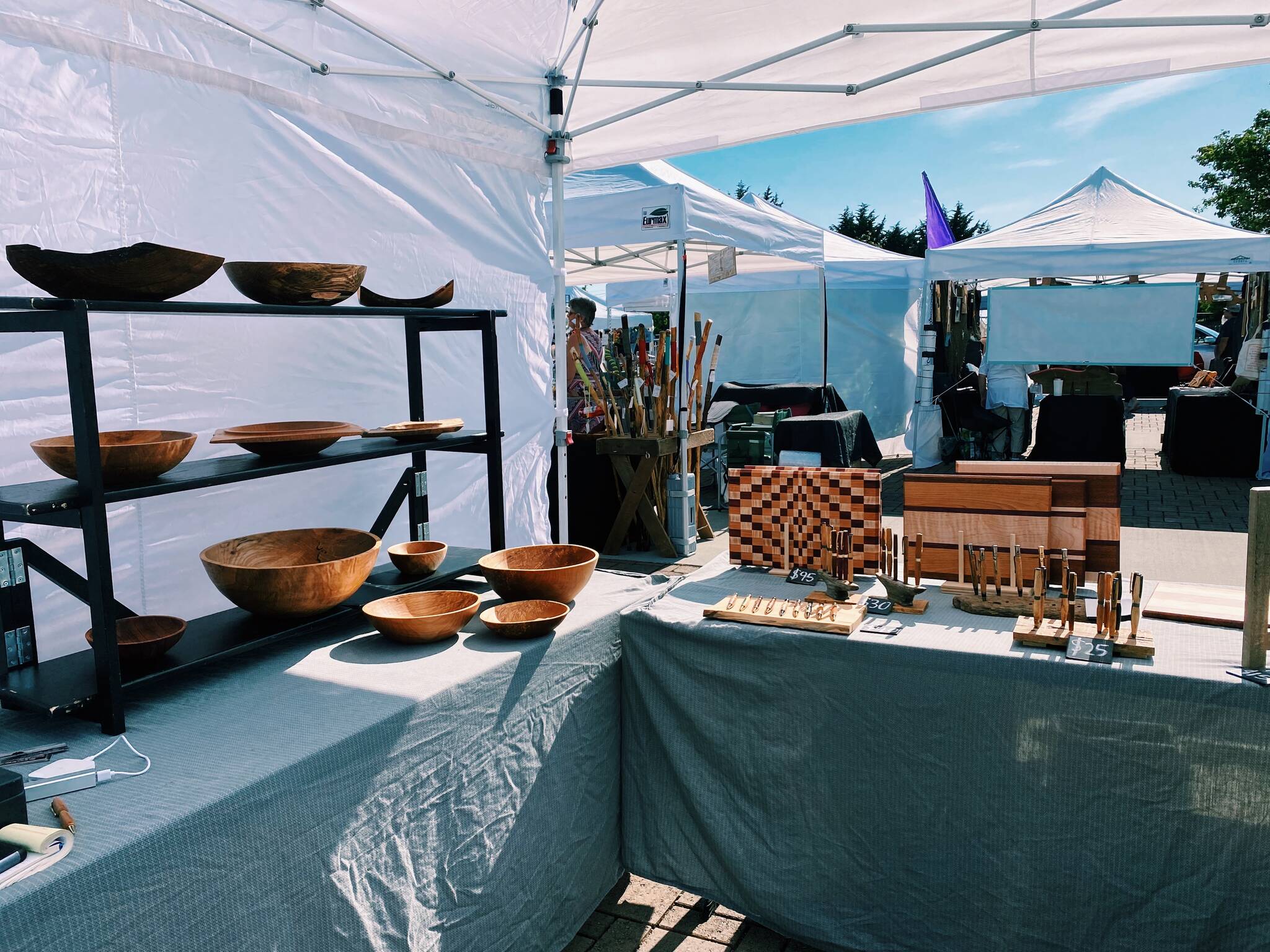 Woodenwares are on display at the Northwest Beach Works booth. Photo by Emma Jane Garcia