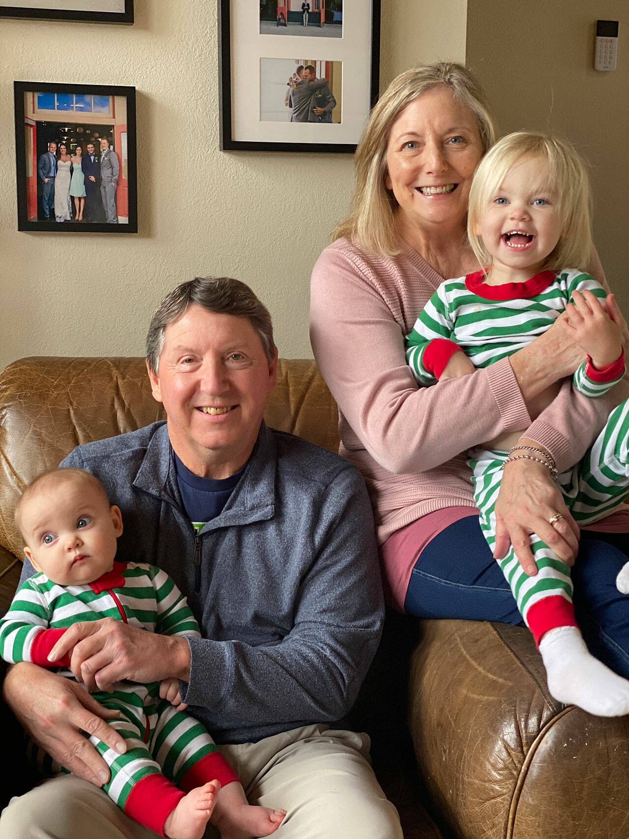 Mark Willis, pictured here with with Polly and granddaughters Hudson, left, and Bryn, in 2020, is recuperating from a series of strokes suffered earlier this month. Photo courtesy of the Willis/Harrington family