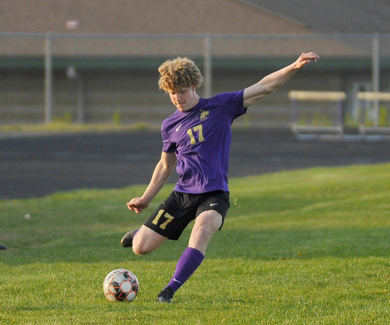 Sequim Gazette file photo by Michael Dashiell
Aidan Henninger, pictured here taking a free kick in Sequim High School’s 6-1 win over Olympic on April 19, 2021, has signed a letter of intent to play for NCAA Division III Franciscan University of Steubenville, Ohio.