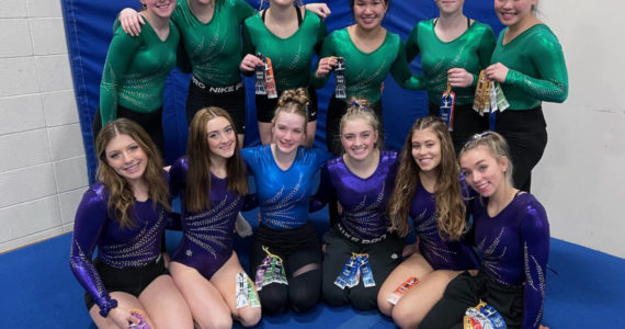 Courtesy photo
The Port Angeles/Sequim/Crescent gymnastics team won a dual with Kingston this weekend. From left, back row, are Faith Caar, Maddie Adams, Kathryn Jones, Yau Fu, Jessamyn Schindler and Mei-Ying Harper-Smith. From left, front row, are Ellie Turner, Danica Pierson, Aubrie Scott, Alex Schmadeke, Amara Brown and Susannah Sharp.