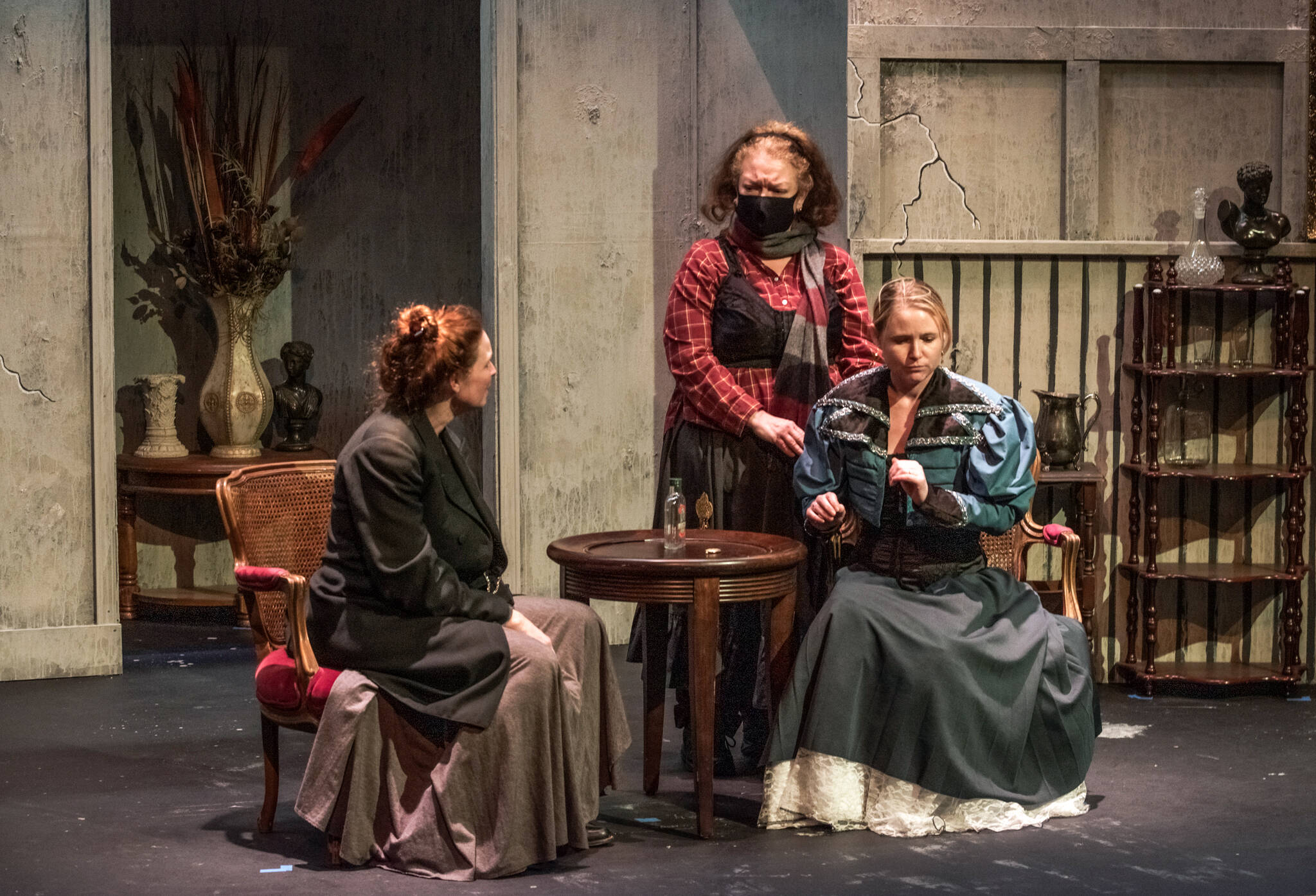 Julie Borden as the housekeeper Elizabeth comforts her mistress, Sierra Brittal as Mrs. Manningham, as she dialogues with Maude Eisele playing Detective Rough in the play “Angel Street” which will run for 2 weeks at Olympic Theatre Arts in Sequim. Sequim Gazette photo by Emily Matthiessen