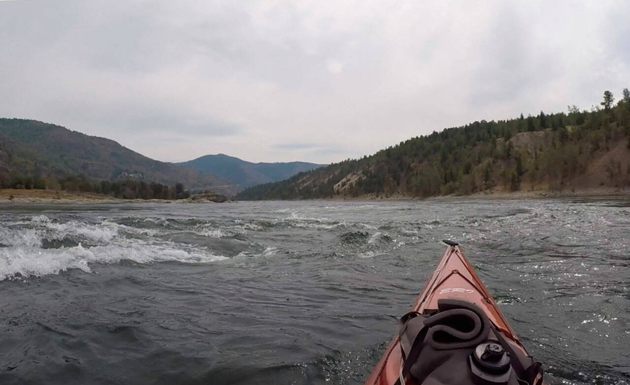 Kayaker John Kuntz approaches rapids near Rock Island. Photo by John Kuntz