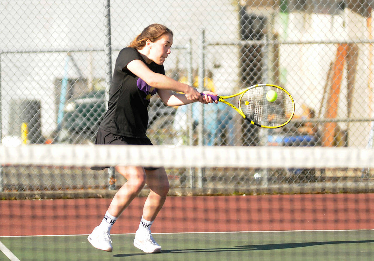 Sequim’s Jordan Hegtvedt returns a shot as she and doubles teammate Malory Morey sweep North Mason’s Emma Hunt and Ava Oldright 6-0, 6-1, on March 22. Hegtvedt earned Player of the Match honors. Sequim Gazette photo by Michael Dashiell