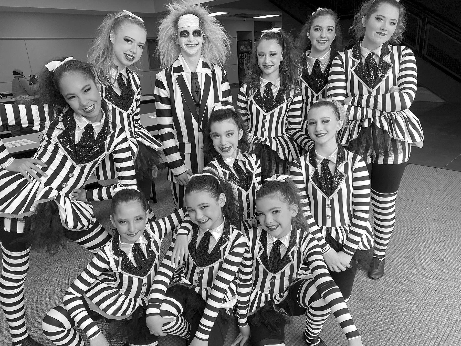 Submitted photo
The Elite Competition Dance Team from The Dance Center by Erica Edwards in Sequim recently earned a Judge’s Choice award and an invitation to perform in New York City for their musical theater large group routine “Beetlejuice.” Team members include, in no particular order, Madison Edwards, Ayla Alstrup, Sofia Divinsky, Sydney Owens, Cyrus Deede, Eva Lancheros-Gillis, Joyce Caulfield, Ava Fuller, Emma Edwards, Mia Buhrer, Addysin Smith, Savanna DeRuyter, Tosca Kattau and Julianne Wilcox.