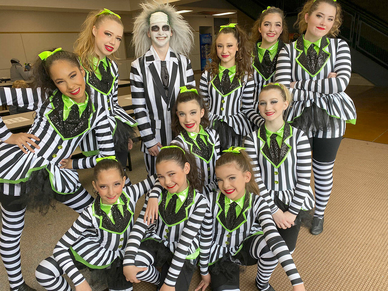 The Elite Competition Dance Team from The Dance Center by Erica Edwards in Sequim recently earned a Judge’s Choice award and an invitation to perform in New York City for their musical theater large group routine “Beetlejuice.” Team members include, in no particular order, Madison Edwards, Ayla Alstrup, Sofia Divinsky, Sydney Owens, Cyrus Deede, Eva Lancheros-Gillis, Joyce Caulfield, Ava Fuller, Emma Edwards, Mia Buhrer, Addysin Smith, Savanna DeRuyter, Tosca Kattau and Julianne Wilcox. Submitted photo