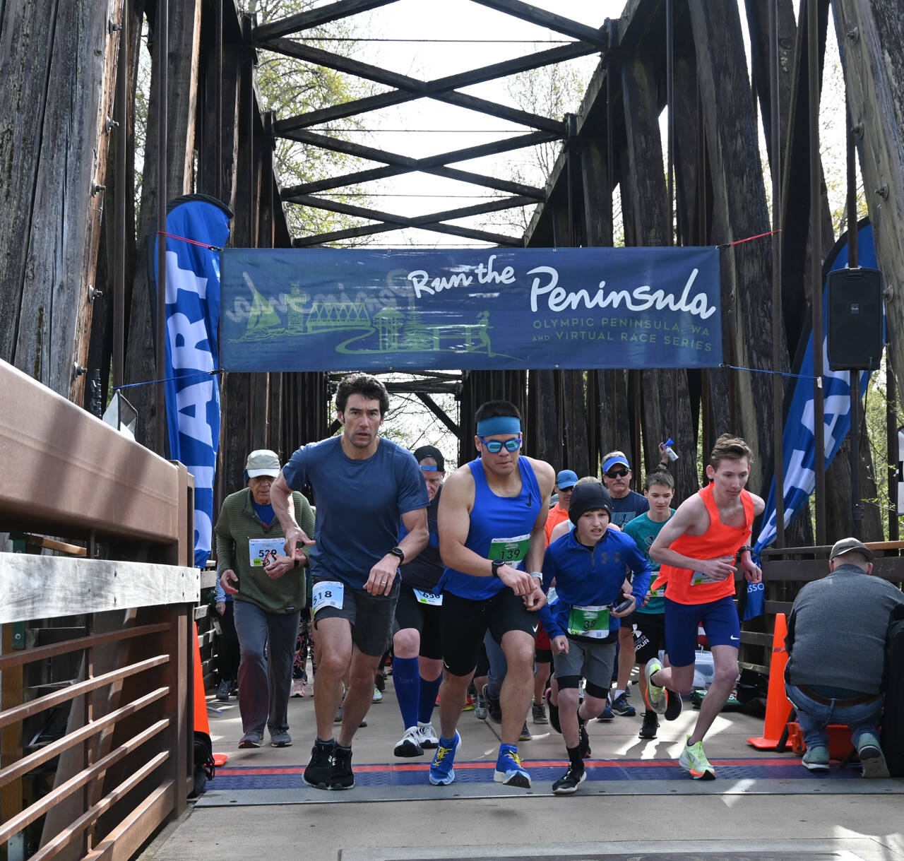 Runners break from the starting line of the 2022 Railroad Bridge 5k/10k in Sequim on Saturday, April 23. Sequim Gazette photo by Michael Dashiell