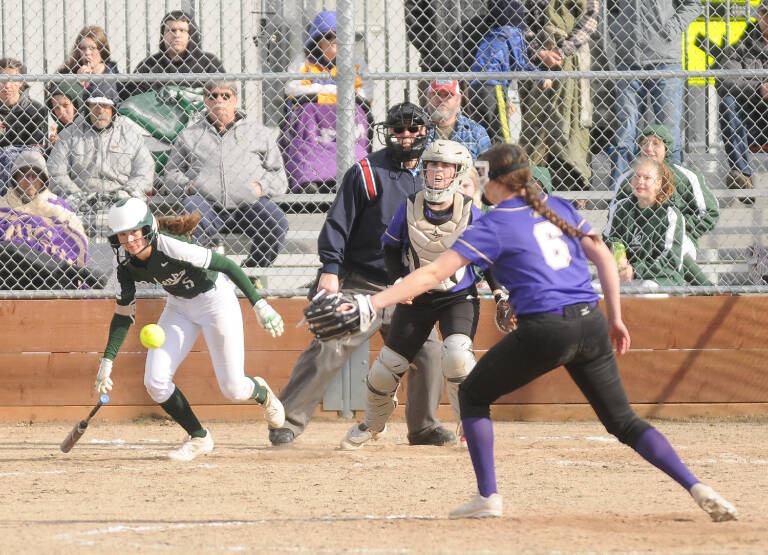 Sequim Gazette photos by Michael Dashiell
Port Angeles’ Zoe Smithson looks for a hit as Sequim catcher Christy Grubb and pitcher Angel Wagner defend the play in PA’s 14-7 win in Sequim on April 19.