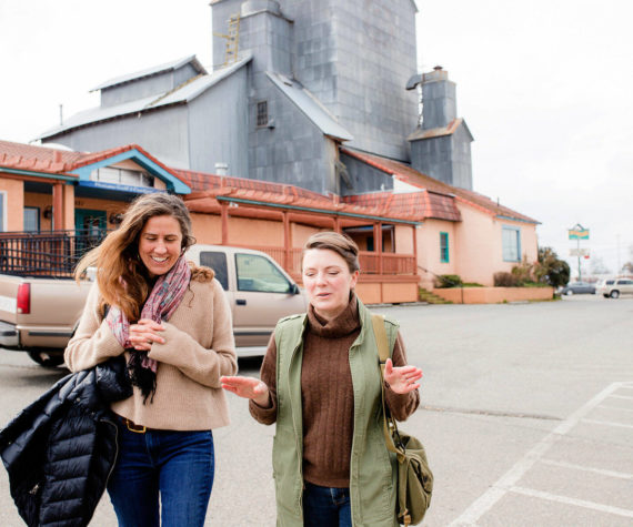 <p>Olympic Angels founder Morgan Hanna of Port Townsend, left, and Love Box volunteer Quinn Mitchell take a walk in Sequim, Mitchell’s home town, to talk about Olympic Angels’ expansion into Clallam County. Photo courtesy of April Thompson/Olympic Angels</p>