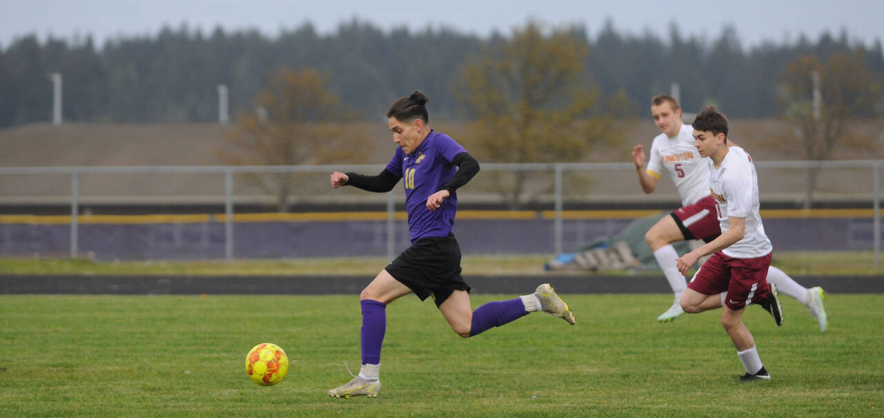 Sequim’s Rafael Flores races toward the Kingston goal early in the first half of the Wolves’ 4-0 win on May 4. Flores opened the scoring with a goal in the 33rd minute. Sequim Gazette photo by Michael Dashiell