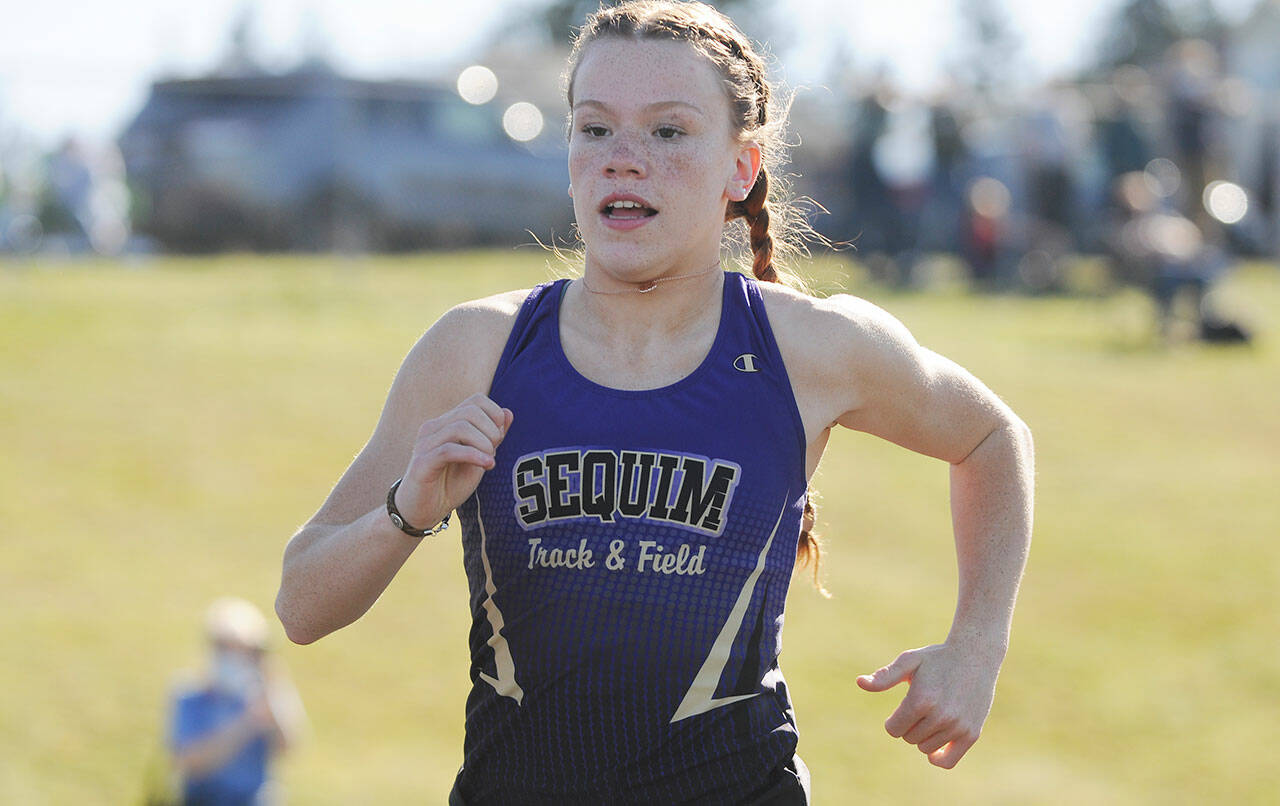 Sequim Gazette FILE PHOTO BY Michael Dashiell
Sequim high senior Riley Pyeatt races to a personal best in the 1,600 meters in 2021.