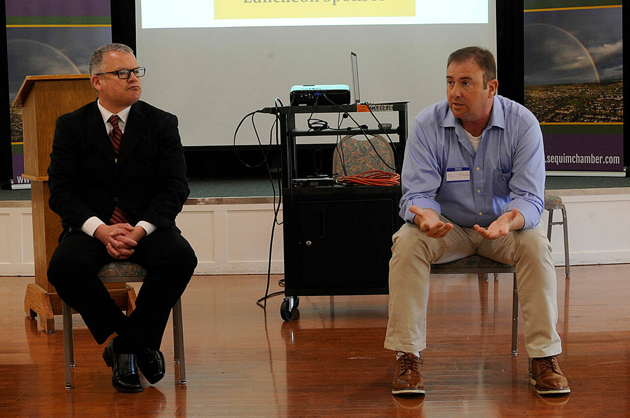 Sequim Gazette photo by Matthew Nash/ Brian King, left, and Marc Titterness seek the Clallam County Sheriff’s position this November following retiring sheriff Bill Benedict. They spoke on Tuesday during the Sequim-Dungeness Valley Chamber of Commerce’s luncheon about staffing, reform and education.