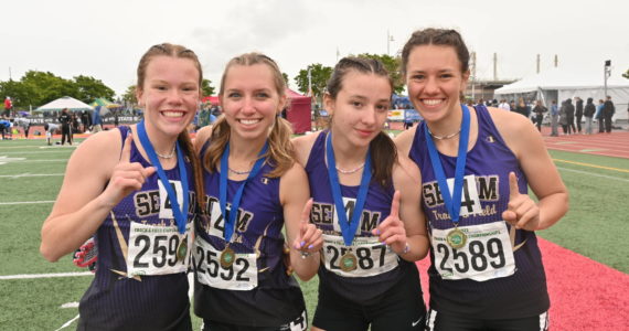 Sequim Gazette photo by Michael Dashiell
Sequim High’s 4x400 relay team celebrates a state title at the 2A state track and field championships at Mount Tahoma High School in Tacoma on May 28. Pictured, from left, are Riley Pyeatt, Hi’ilei Robinson, Kaitlyn Bloomenrader and Eve Mavy. The team helped Sequim’s girls place fifth overall. See story, A-7.