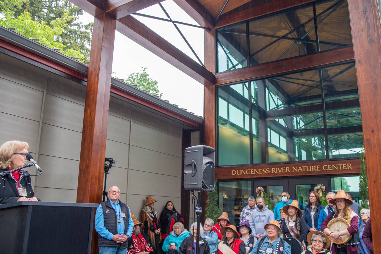Sequim Gazette photo by Emily Matthiessen/ Annette Hanson, left, gives thanks to the dozens of partners and community members who helped fund the multi-million-dollar expansion of the Dungeness River Nature Center Sunday afternoon.