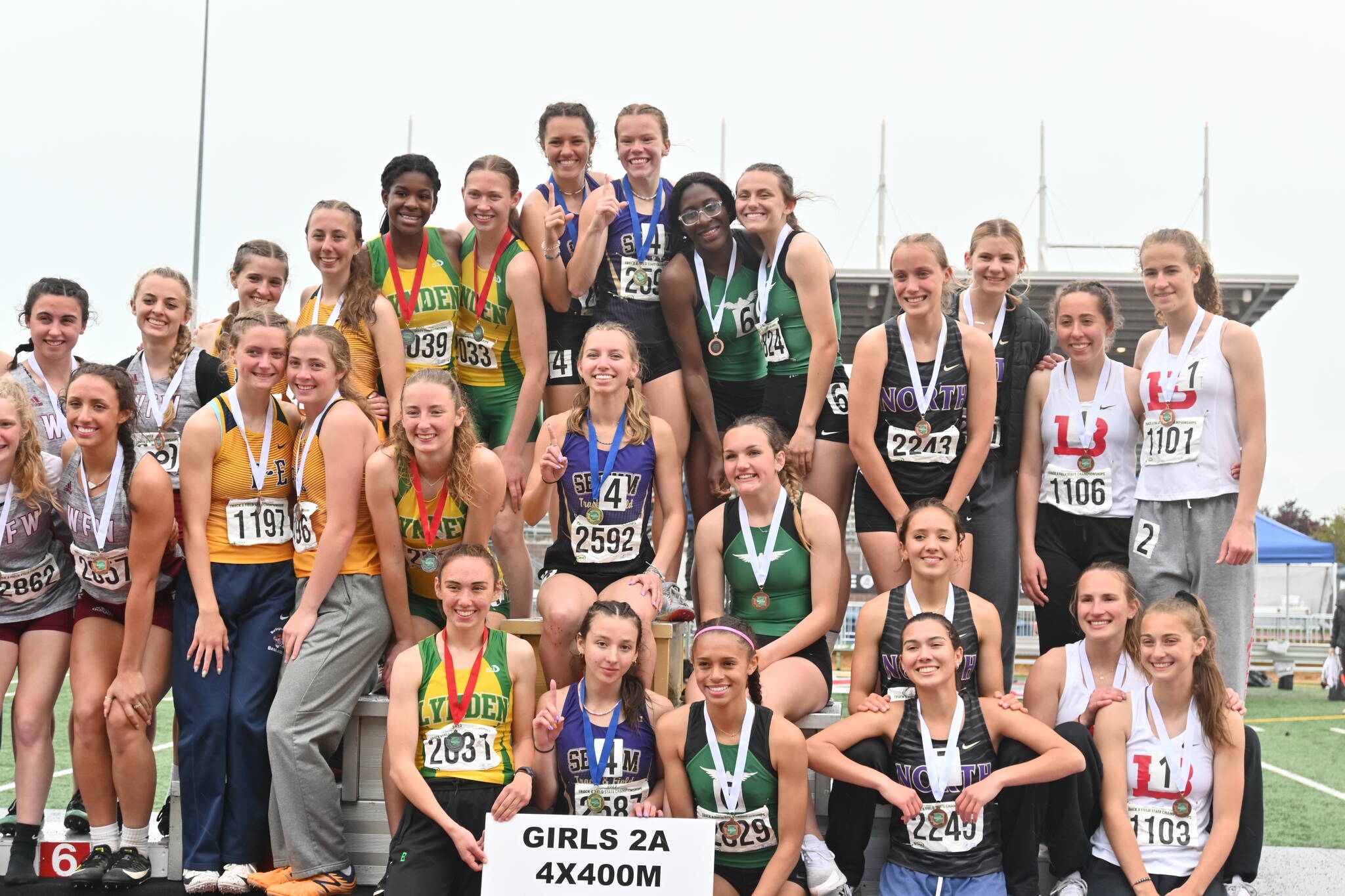Sequim’s 4x400 relay team of Kaitlyn Bloomenrader, Riley Pyeatt, Eve Mavy and Hi’ilei Robinson celebrate a first place finish at the state 2A meet in Tacoma on May 28. Sequim Gazette file photo by Michael Dashiell