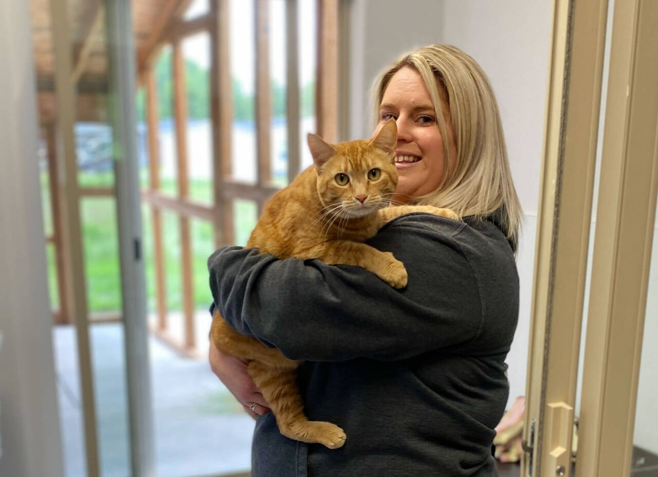 Kitty City manager Michelle Gentry invites community members to check out the Olympic Peninsula Humane Society’s new campus at 91 S. Boyce Road at the June 18 open house. Photo courtesy of Olympic Peninsula Humane Society