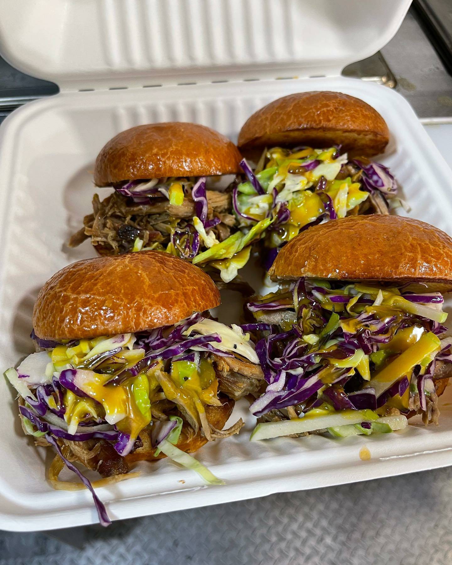 Image courtesy of Southern Nibble
Pork Sliders with fresh coleslaw and homemade sauce are one of the menu items that customers said keep them returning to Southern Nibble, a food truck run by married couple Charmaine and Caleb Messinger.
