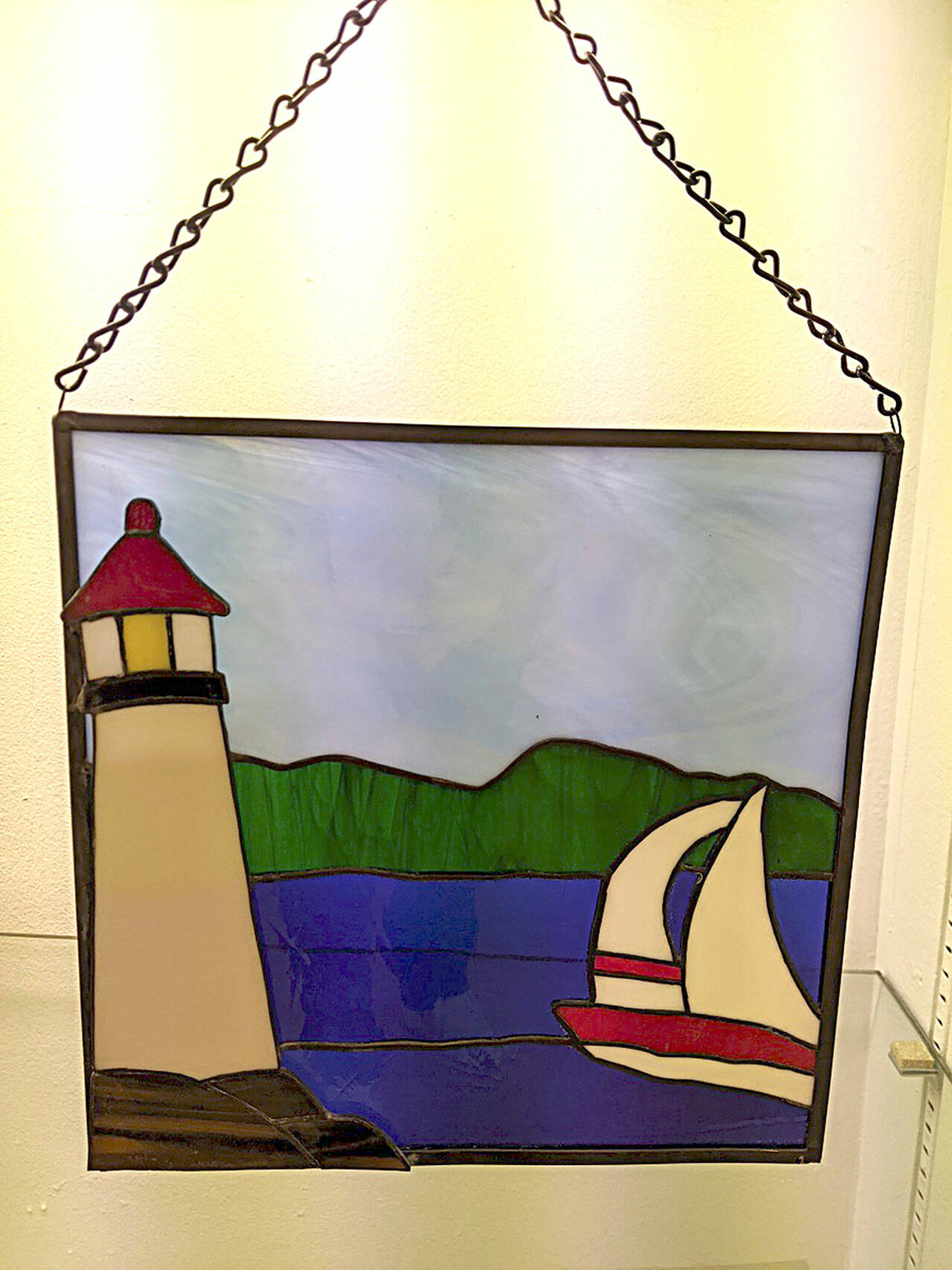 Submitted photo
June Echternkamp is one of the featured artists at the Blue Whole Gallery in July. “Sailing,” a stained glass work, is one of her many pieces on display.