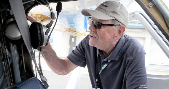 DART volunteer pilot Ray Ballantyne of Sequim prepares his airplane for a training airlift to Diamond Point Airport from Port Angeles on Saturday. (Keith Thorpe/Peninsula Daily News)