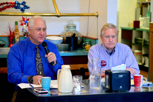 Photo by Peter Segall/Olympic Peninsula News Group
Brian Pruitt, a Republican candidate for state House of Representatives District 24, Position 2, left, speaks during a candidate debate at Joshua’s Restaurant in Port Angeles on July 12. Pruitt is challenging incumbent Steve Tharinger, a Democrat who’s held the seat since 2010, seated at right.