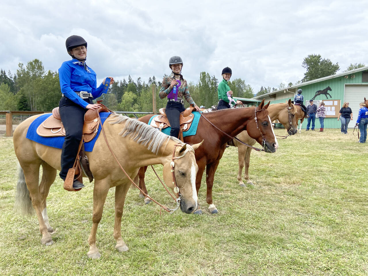 Submitted photo
From left, Ruby Coulson on Sandy, Taylor Maughan on Ru, and Celbie Karjalainen on Citrene, compete at the Neon Riders/Silver Spurs 4H Horse Show and Pre-Fair event in mid-July.