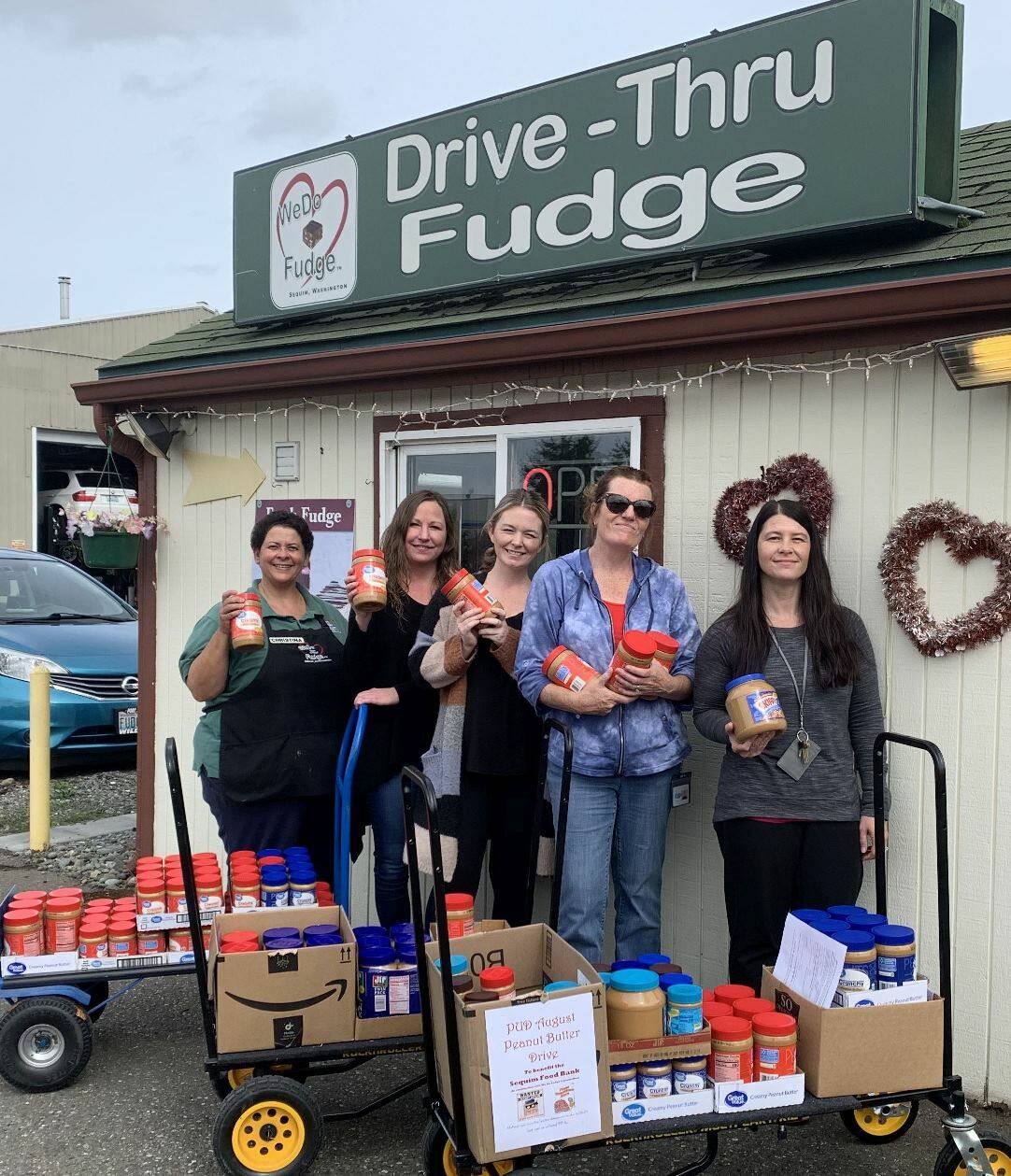 Submitted photo
WeDo Fudge and Clallam County Public Utility District team up in 2019 to donate 342 pound of peanut butter and $751 to the Sequim Food Bank.