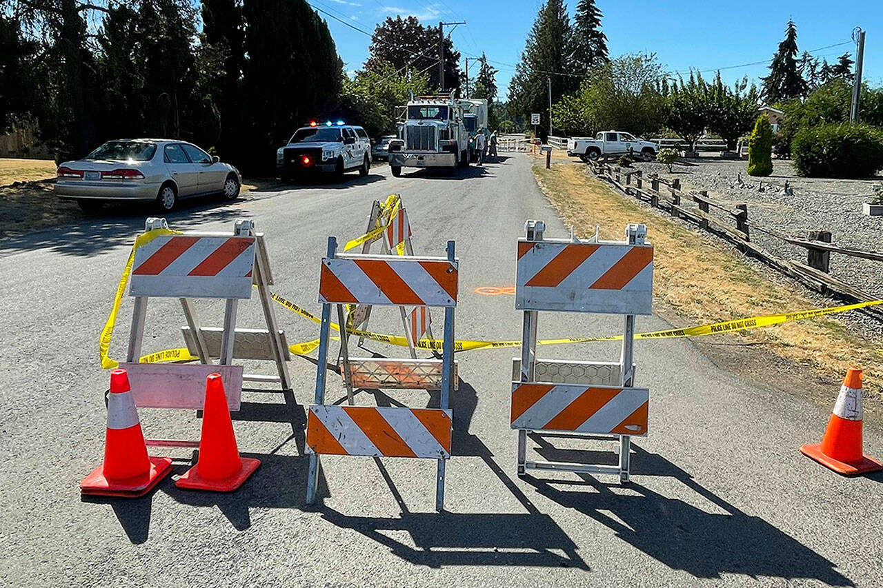 Sequim Gazette photo by Matthew Nash/ Access from River Road to West Silberhorn Road was closed for several hours on Aug. 8 after a cyclist died after being struck by a garbage truck.