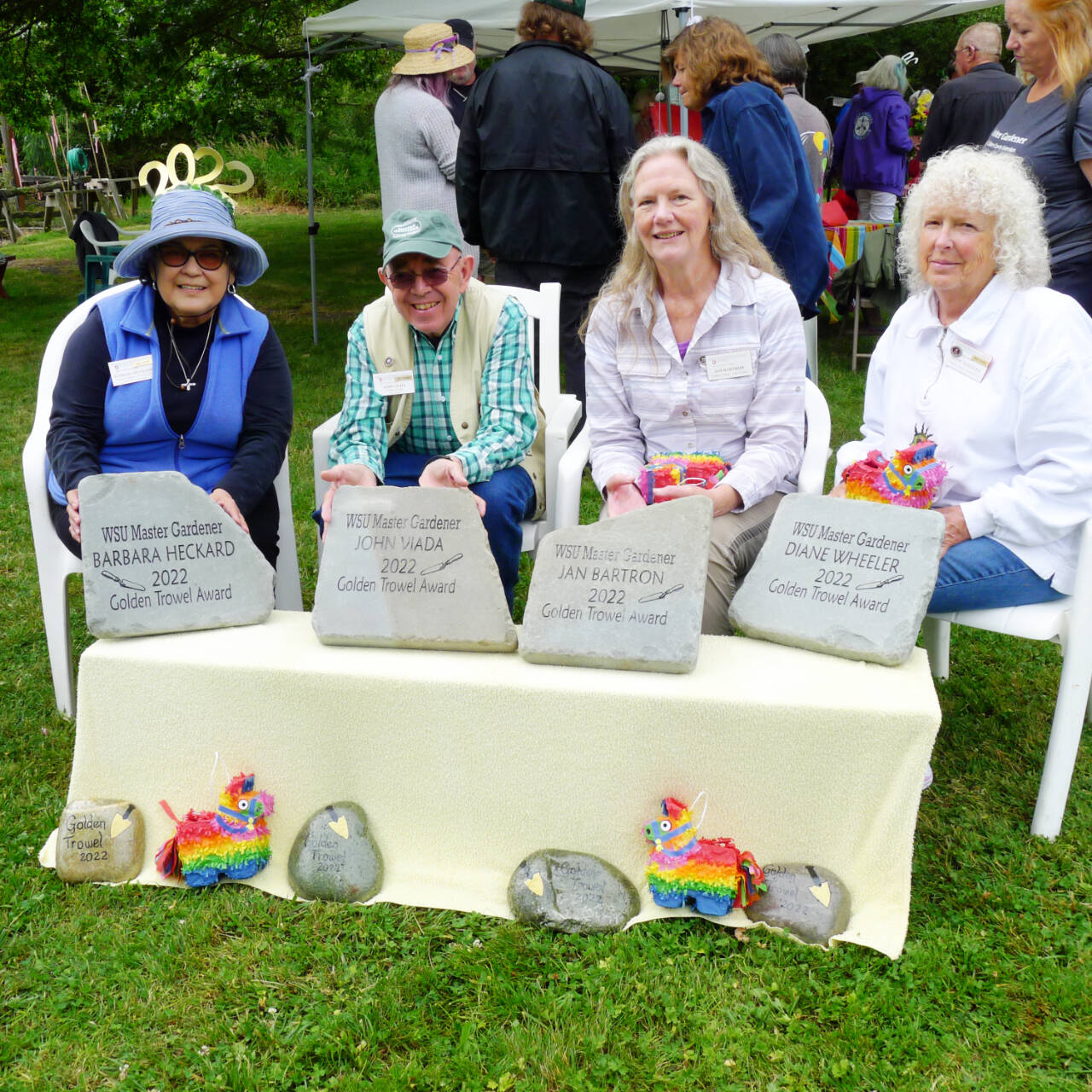 Submitted photo
Clallam County Master Gardeners honor four fellow green thumbs with the 2022 Golden Trowel awards, including (from left) Barbara Heckard, John Viada, Jan Bartron and Diane Wheeler.