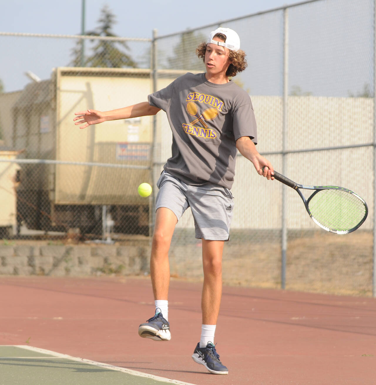 Michael Dashiell/Sequim Gazette
Sequim’s Garrett Little returns a shot as he takes on North Kitsap’s Indigo Gallagher-Zapf in No. 1 singles play on Sept. 13. Sequim was scheduled to play Kingston on Sept. 19. Little topped Gallagher-Zapf 6-1, 6-0. The Wolves are at Olympic on Sept. 21 and host Port Angeles on Sept. 22.