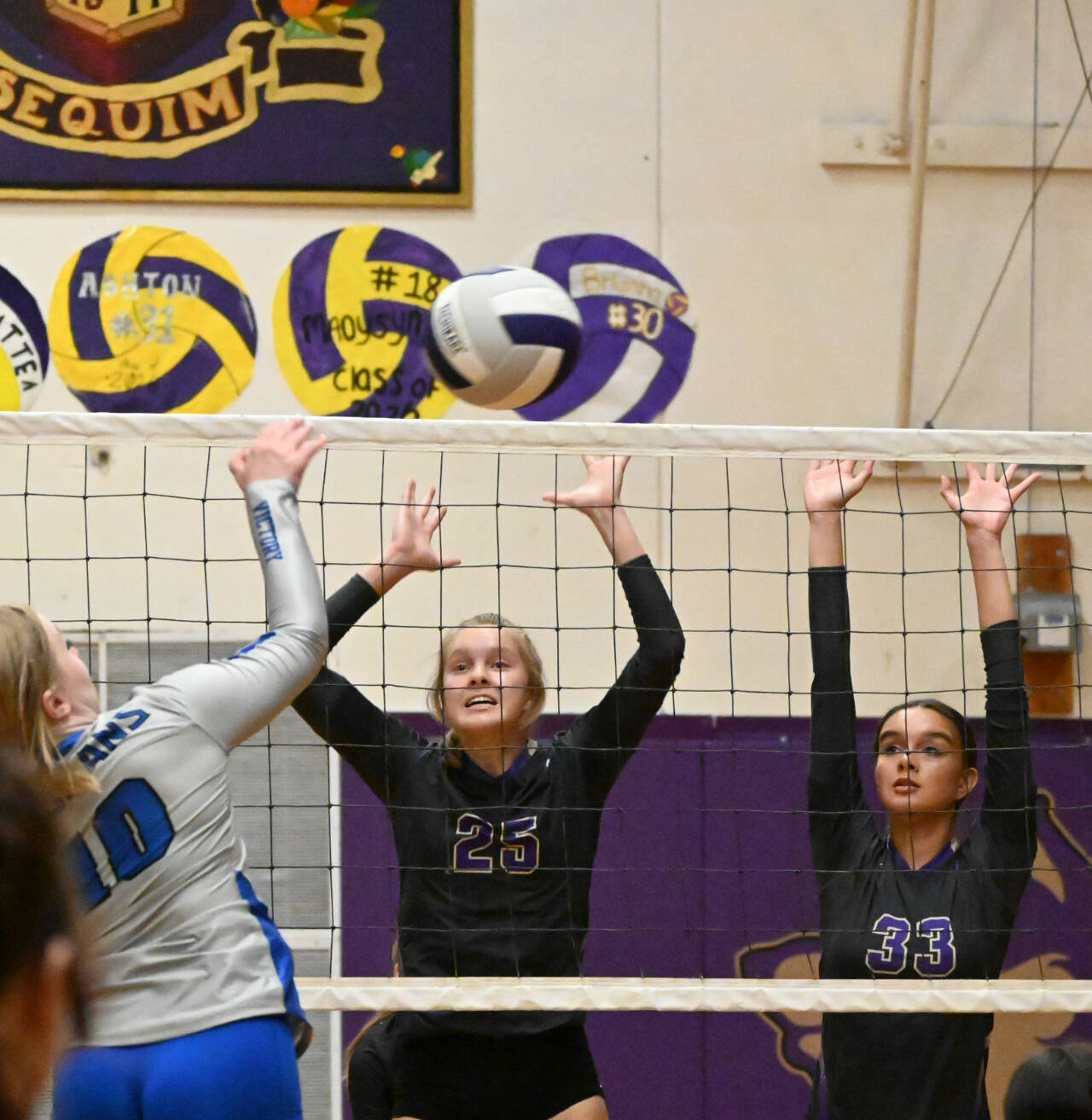 Michael Dashiell/Sequim Gazette
Sequim’s Jolene Vaara, center, and Arianna Stovall look to block a shot by Olympic’s Ellie Swan in a league match-up on Sept. 20.