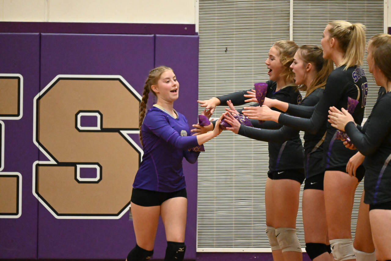 Sequim Gazette photo by Michael Dashiell / Senior libero Mia Coudriet and SHS volleyball teammates are introduced prior to a Sept. 20 league match-up against Olympic on Sept. 20.