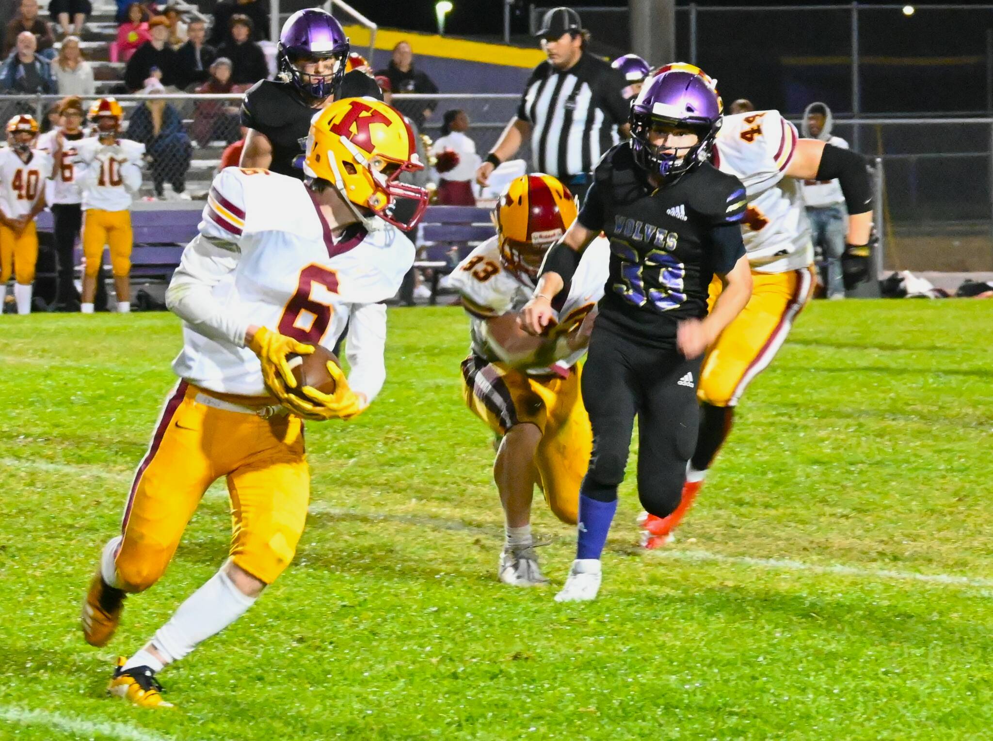 Sequim Gazette photo by Michael Dashiell / Sequim’s Sam Fitzgerald looks to tackle Kingston’s Hans Reber in the second half of the Wolves’ 27-13 Homecoming win on Sept. 30.