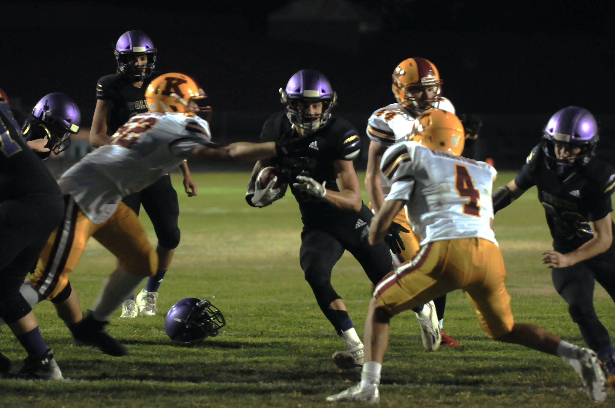Sequim Gazette photo by Michael Dashiell / Sequim’s Aiden Gockerell, center, drives into the end zone for a first quarter touchdown in the Wolves’ 27-13 Homecoming win over Kingston on Sept. 30.
