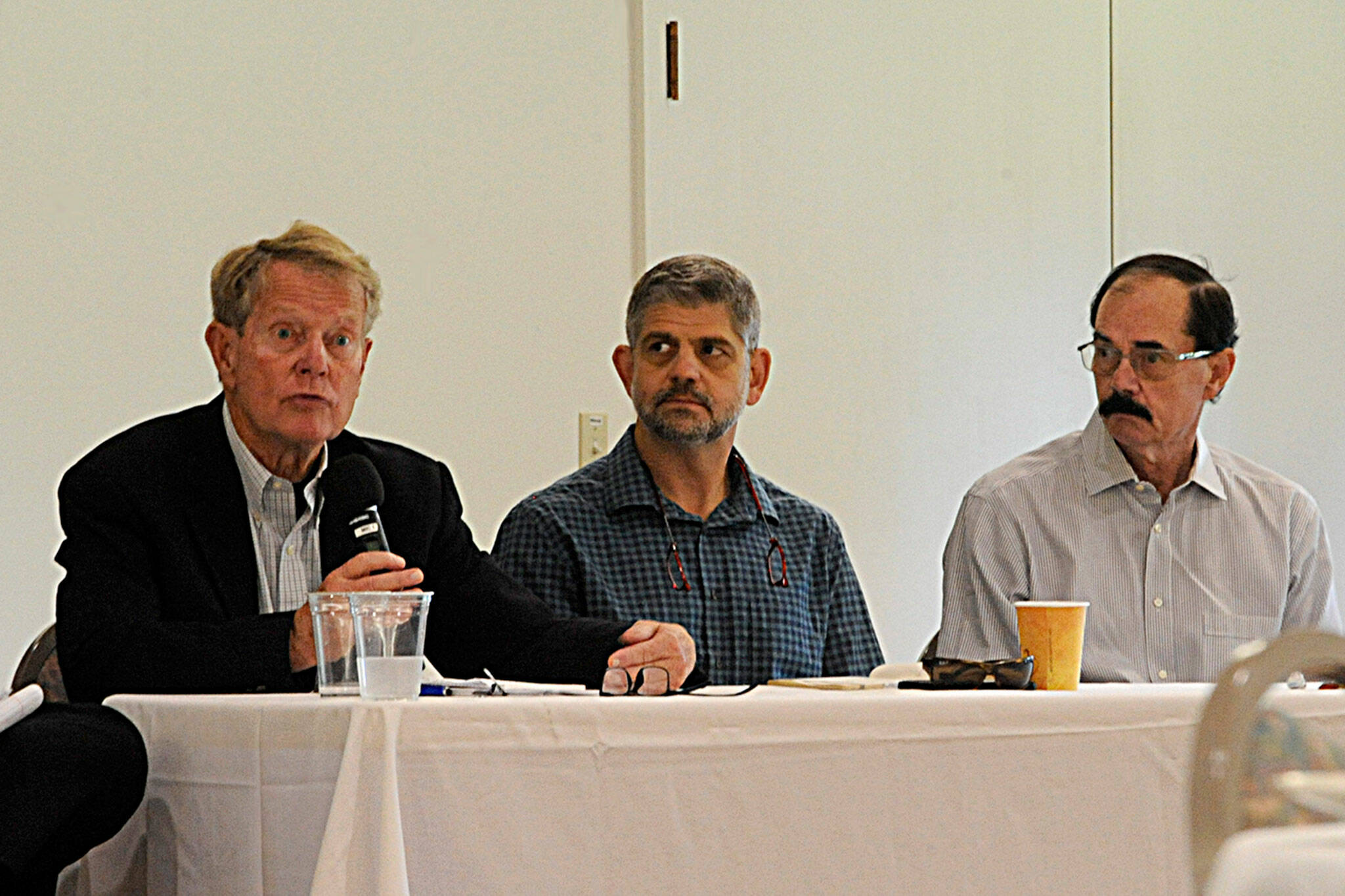 Sequim Gazette photo by Matthew Nash/ Clallam County commissioners Randy Johnson, Mark Ozias, and Bill Peach speak during the Sequim-Dungeness Valley Chamber of Commerce luncheon on Sept. 27. They touched on the varying 2023 budget, capital projects and general needs of residents.