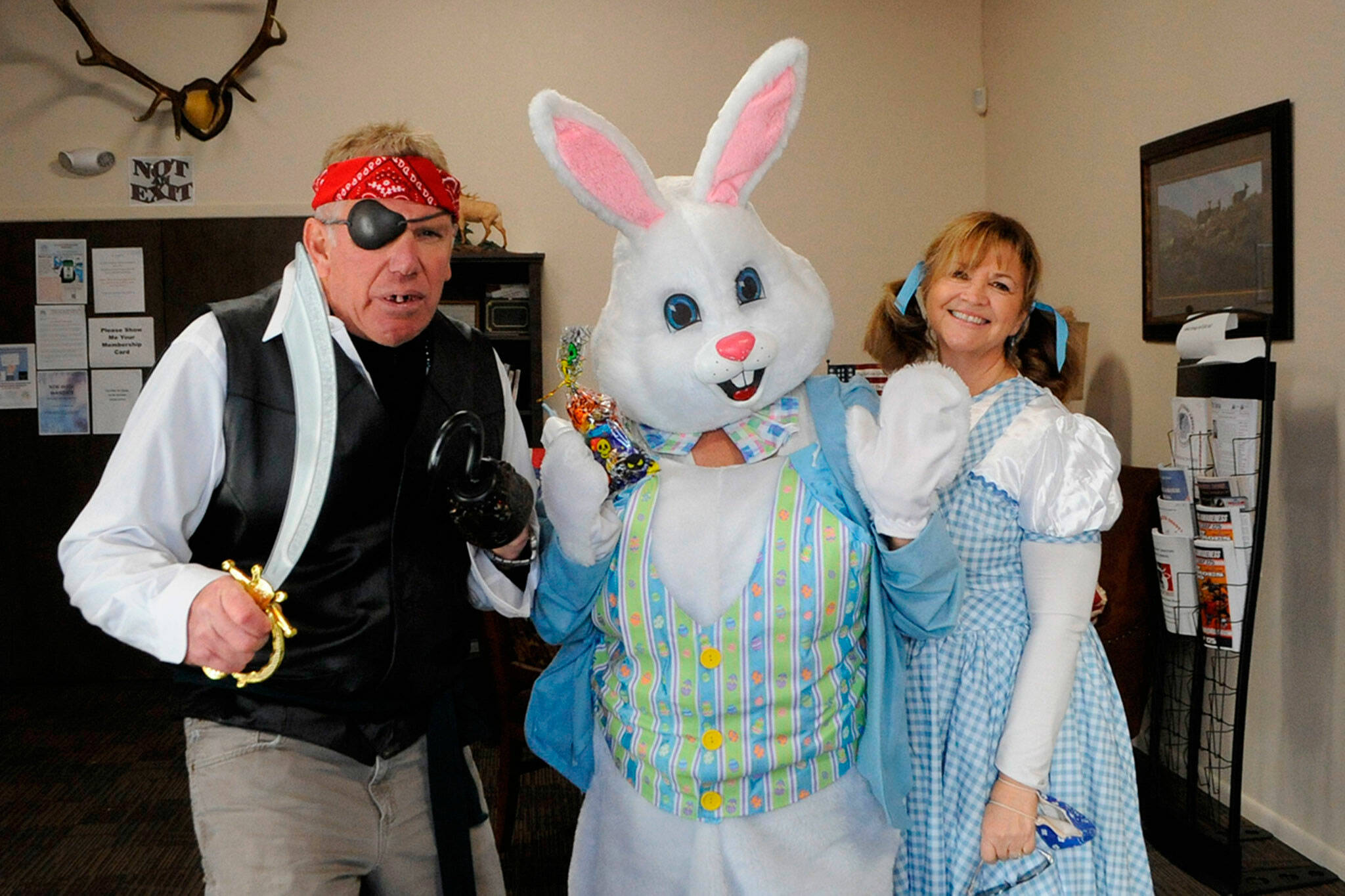 Sequim Gazette file photo by Matthew Nash/ During the Sequim Elks Lodge’s drive-thru event in 2021, Jace Cutler the pirate, Karen Lewis the Easter Bunny, and Lori Taylor as Dorothy from the “Wizard of Oz” handed out candy. The Elks offer their event again from 3-5 p.m. on Halloween.