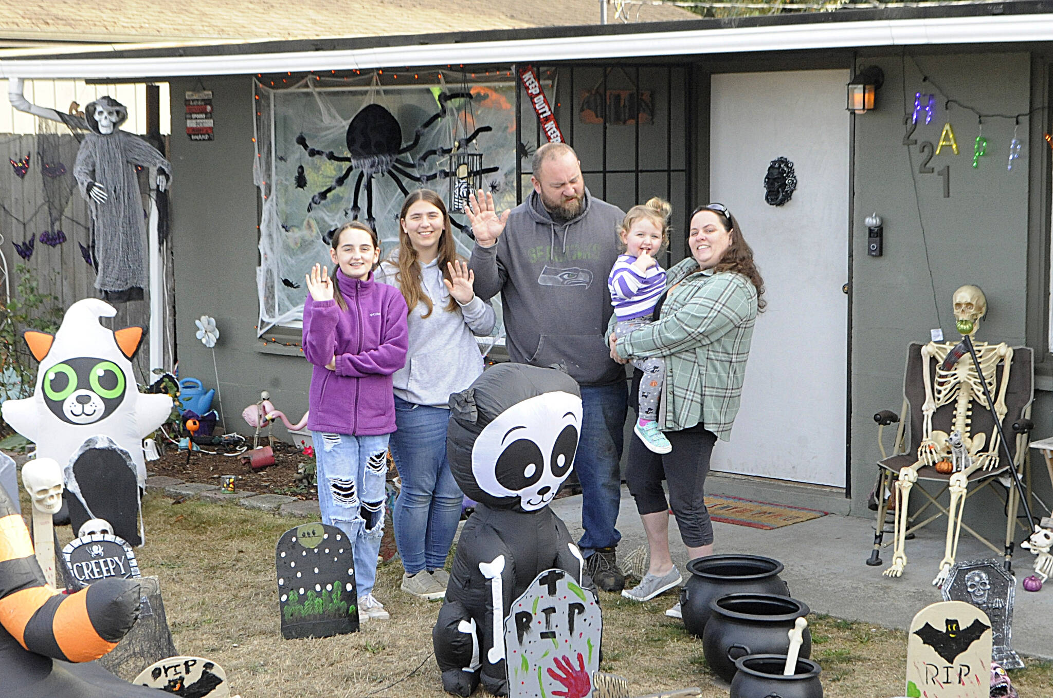 Sequim Gazette photo by Matthew Nash/ One of the most decorated spots in Sequim for Halloween can be found on 221 W. Prairie St., home to, from left, Abby Vogel, Sierra Lomker, Phil Lomker, Parker Lomker, and Lindsey Kester.