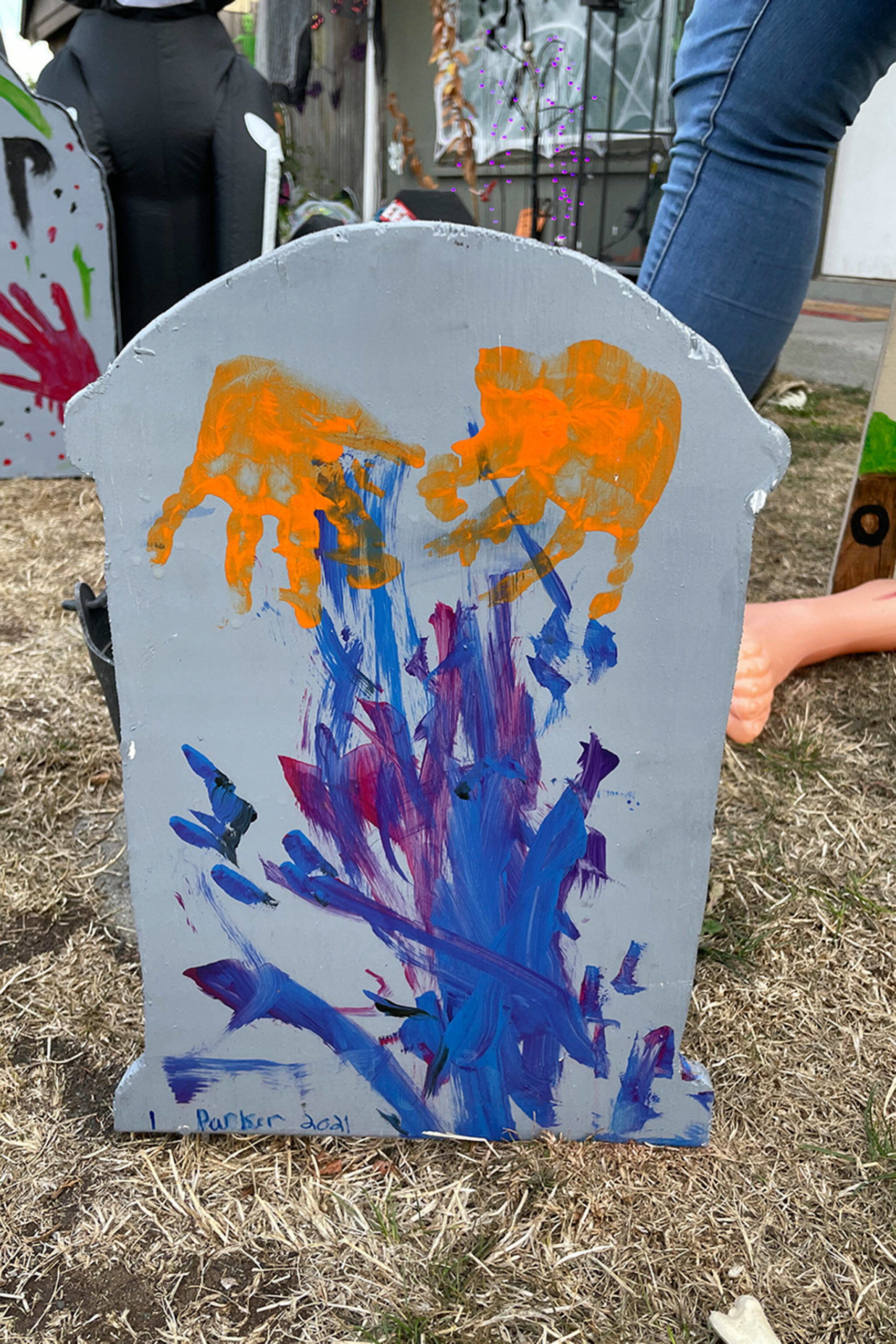 Sequim Gazette photo by Matthew Nash/ Each year, the Lomker/Kester family decorates new gravestones for their yard. This was the first made by daughter Parker Lomker.