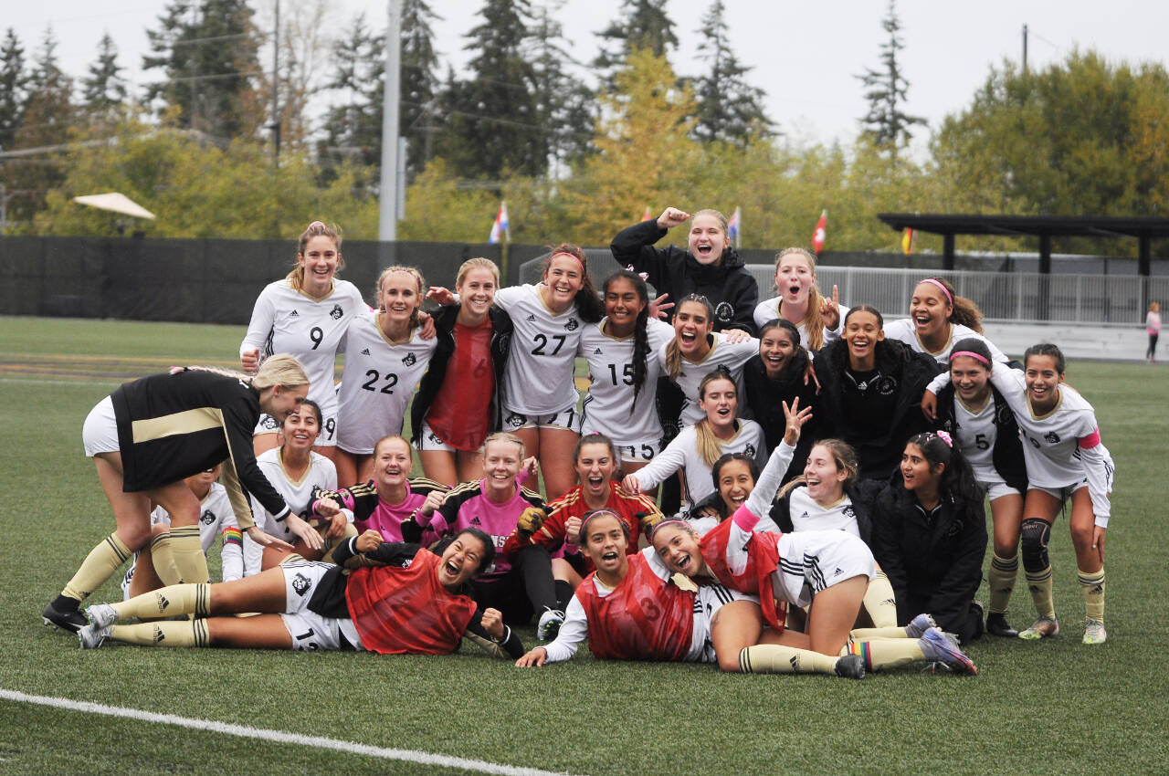 Sequim Gazette photo by Michael Dashiell / Peninsula College’s women’s soccer squad celebrates a 6-0 home win over Bellevue on Oct. 26.