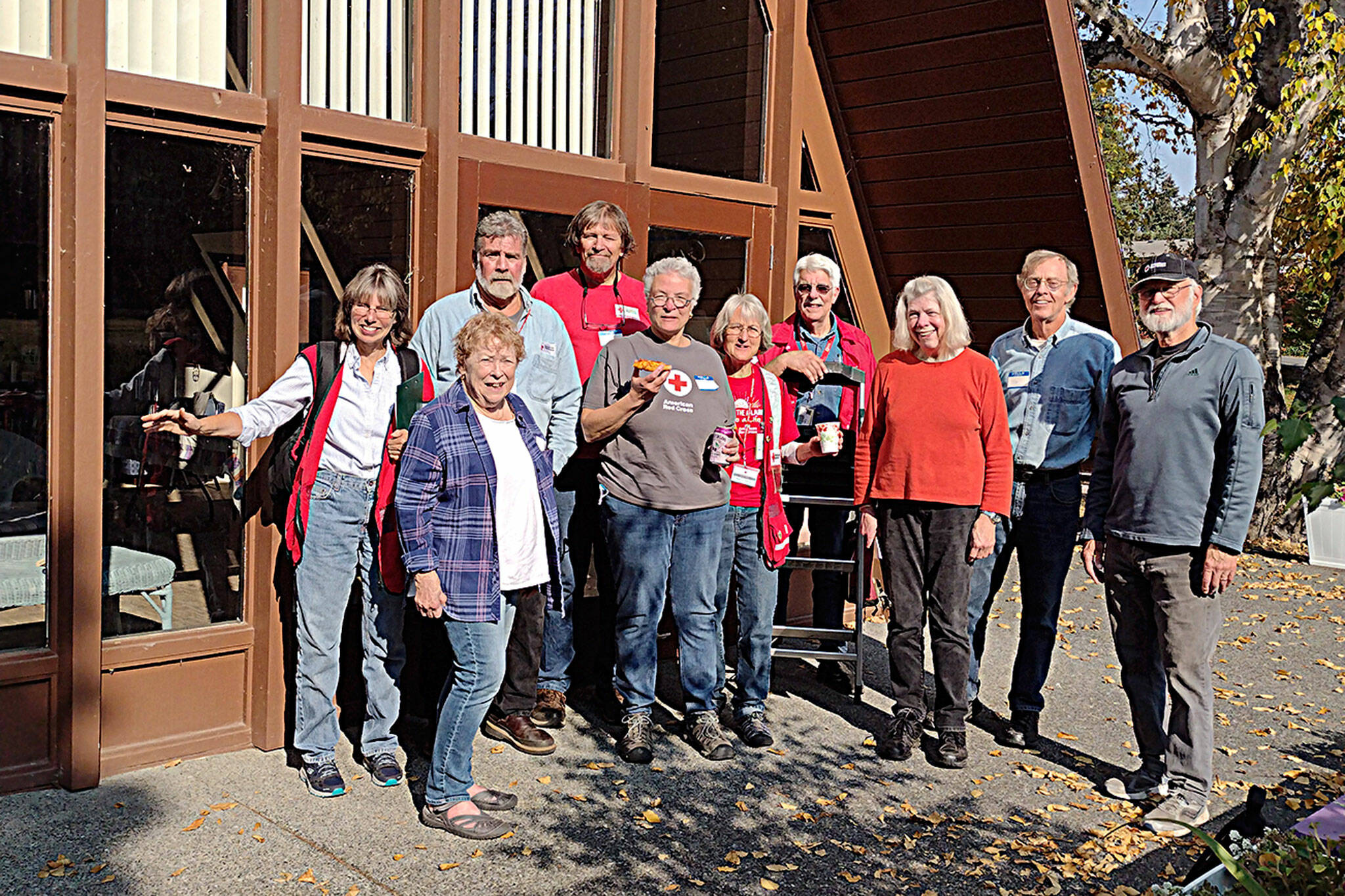 Photo courtesy of Jean Pratschner/ Volunteers with Clallam County Red Cross installed 63 smoke alarms on Oct. 15 in Dungeness Meadows as part of the “Sound the Alarm” program to install free alarms and provide safety advice for fires and earthquakes.