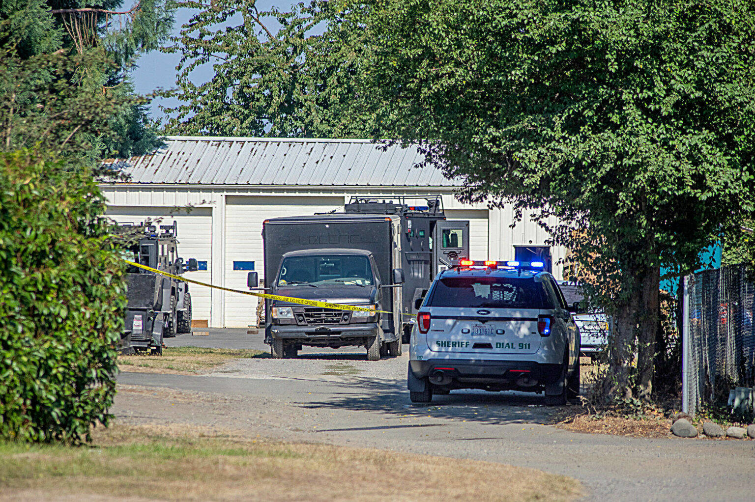 Sequim Gazette file photo by Emily Matthiessen
Members of the Kitsap Critical Incident Response Team (KCIRT) investigate an active shooter situation off Priest Lane on Sept. 22 that resulted in the shooter’s death. He was later identified as 49-year-old Terris Vincent Hetland.