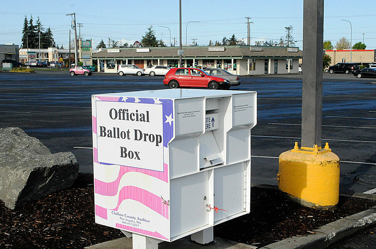Sequim Gazette photo by Matthew Nash/ Sequim Police Department deputy chief Mike Hill reports that a nonpartisan group of ballot box observers at 651 W. Washington St. have not broken any laws and have obeyed state law despite some residents’ calls of concern about alleged harassment. “Harassment isn’t passive … and just sitting in a public place,” he said.
