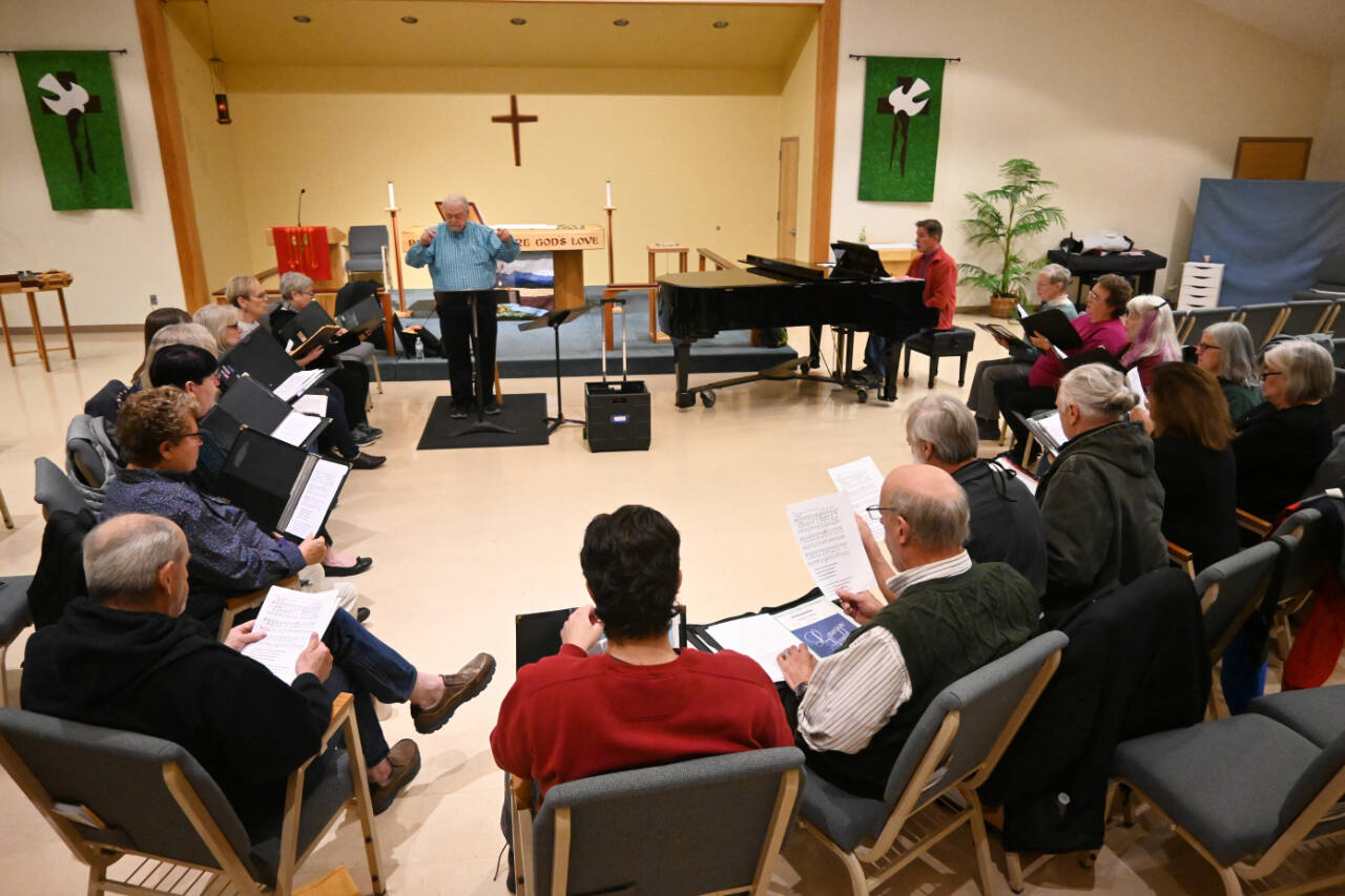 Sequim Gazette photos by Michael Dashiell
Led by conductor Jerome Wright and accompanied by Mark Johnson, the Peninsula Singers last week rehearse for upcoming fall concert dates at Dungeness Valley Lutheran Church.