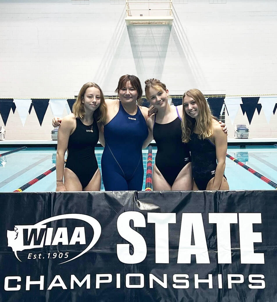Submitted photo
Sequim High’s 4x400 relay team — from left, Annie Ellefson, Melia Nelson, Natalie Cross and Hi’ilei Robinson — celebrate a 13th place finish at the state 1A/2A swimming and diving championships last week in Federal Way.