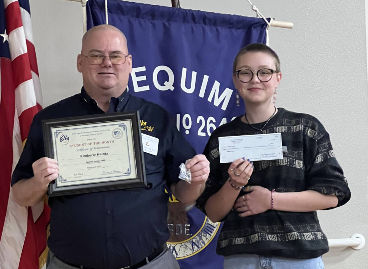Submitted photo / Sequim High School’s Kimberly Heintz accepts her Sequim Elks Lodge Student of Month award for November 2022 from Jim Headley, the lodge’s secretary and past exalted ruler.