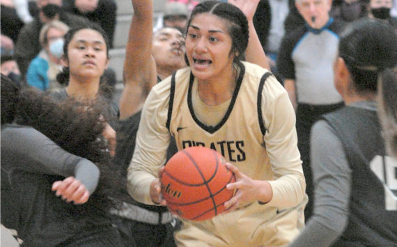Keith Thorpe/Peninsula Daily News
Peninsula's Ituau Tuisaula finds herself surrounded by the Shoreline defense during Wednesday's game in Port Angeles.