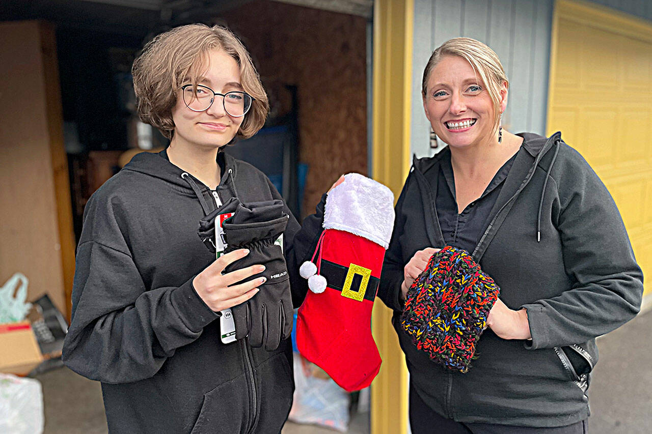 Sequim Gazette photo by Matthew Nash/ For the second year, River Jensen, left, and her mom Anna Larsen plan to use stockings for River’s Christmas Project to supply toiletries to local homeless people and others in crisis. River, now 16, started the project seven years ago.